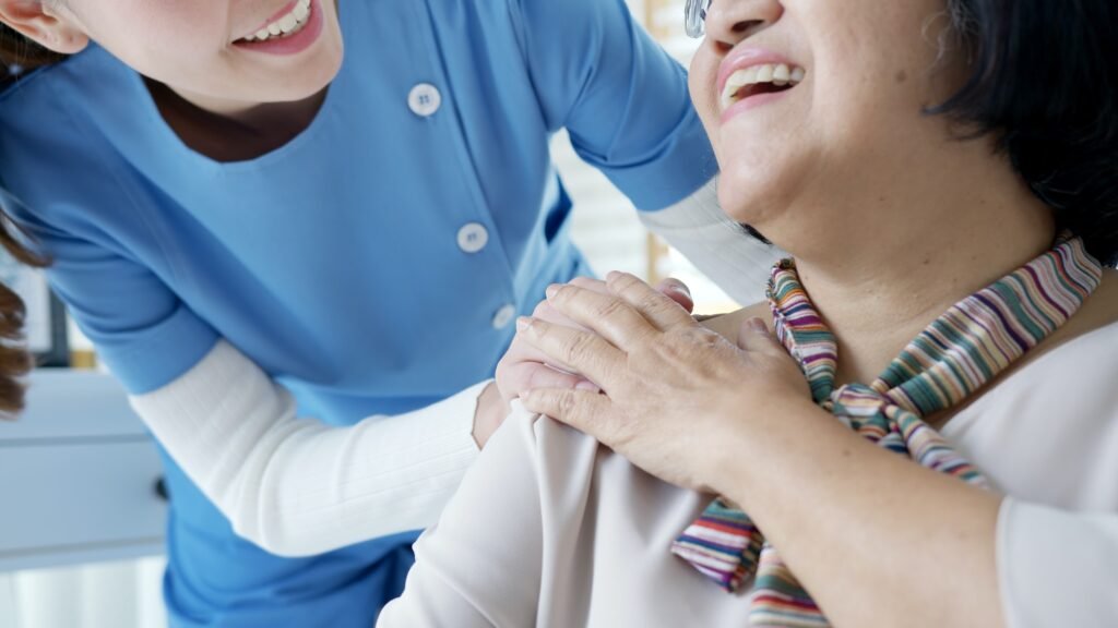 Nurse home care hand on senior grandmother shoulder give support empathy